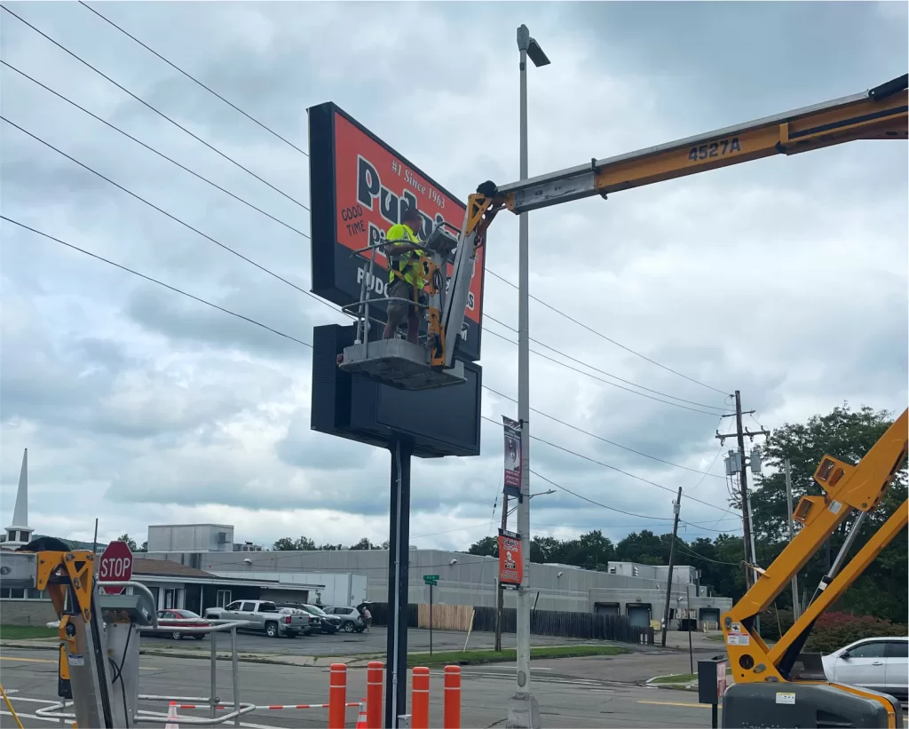 Pudgies Pizza Sign 