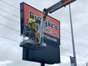 pudgies pizza sign